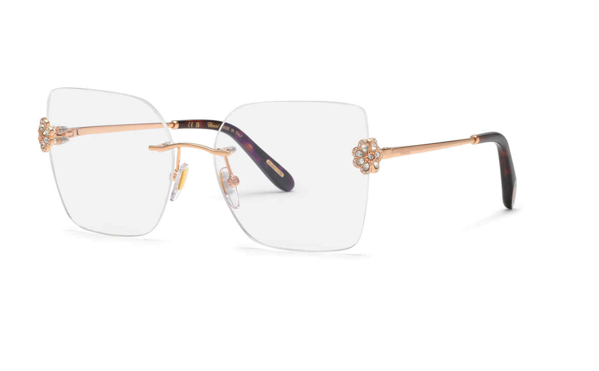 Shiny Copper Gold:
Chopard VCHL60S Soft Square Rimless Eyeglasses in Shiny Copper Gold — women's rimless metal frame with rose gold-tone bridge and floral crystal hinge accents