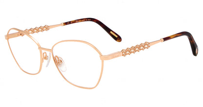 Chopard VCHM96S women's geometric metal eyeglasses in Copper Gold with a full rim, ornate temple accents, and patterned temple tips.

