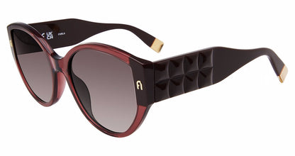 Shiny Transparent Raspberry:
Furla SFU784 Butterfly Sunglasses in Shiny Transparent Raspberry — women's full plastic frame, hingeless, prescription-ready
